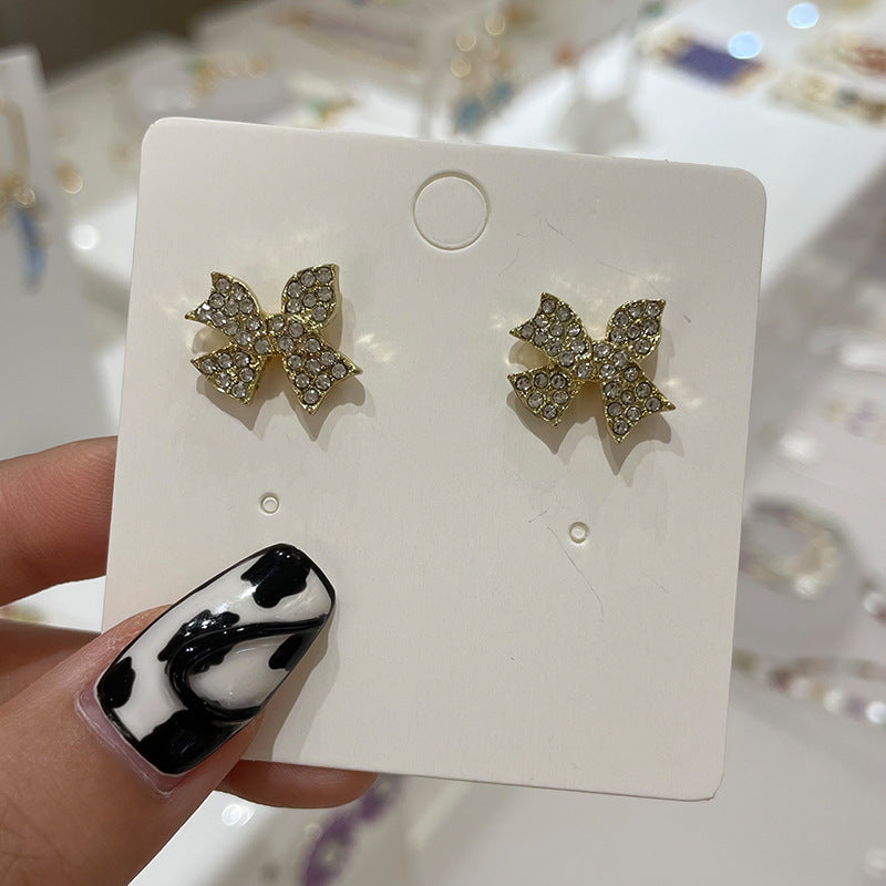 Wholesale Bow Oil Dripping Diamond Snowflake Earrings